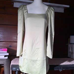 Danielle Bernstein create it for Macy’s Long sleeved dress and flat sandals.